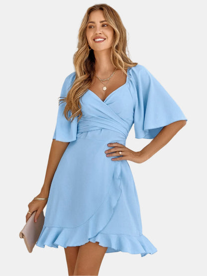 Claire | Lichtblauwe zomerse midi wikkeljurk