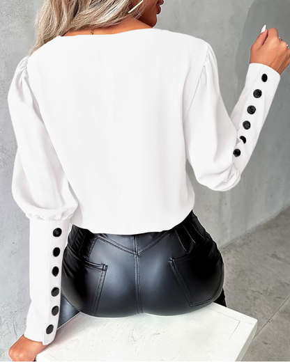 Natalie | Elegante Bluse mit Gigotärmeln und Knöpfen