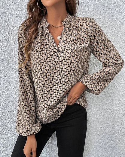 Grace | Stijlvolle V-hals blouse met print
